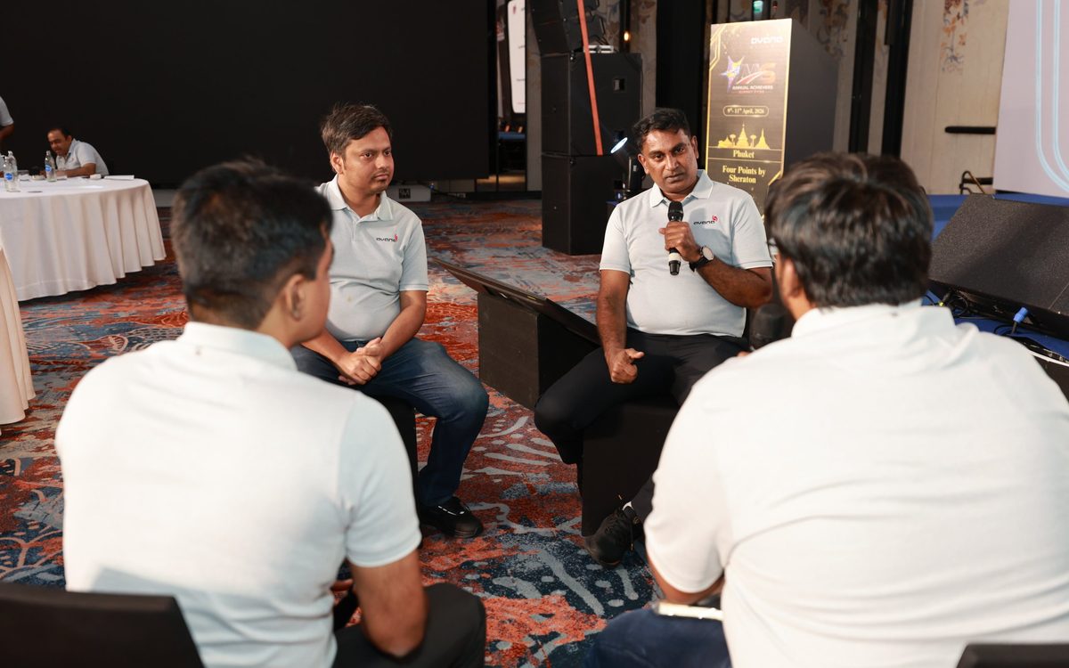 Avana team members in conversation at the Annual Achievers Summit